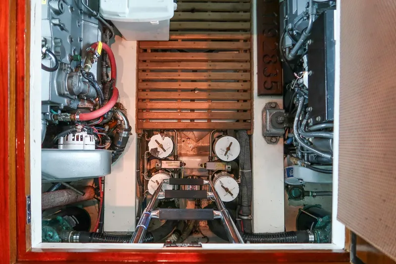 Slide: The Image of Engine room of 2007 Grand Banks 39 Eastbay SX, showcasing mechanical components and systems. - 41