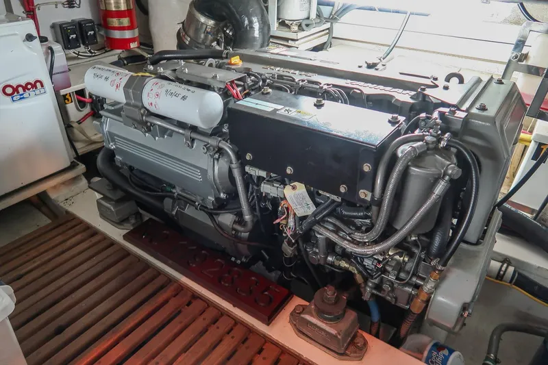 Slide: The Image of Engine room of 2007 Grand Banks 39 Eastbay SX with Yanmar engine and Onan generator. - 43