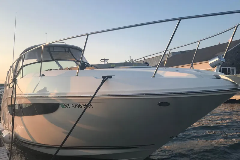 Slide: The Image of 2017 Sea Ray Sundancer 370 docked at sunset, showcasing sleek design and modern features. - 6