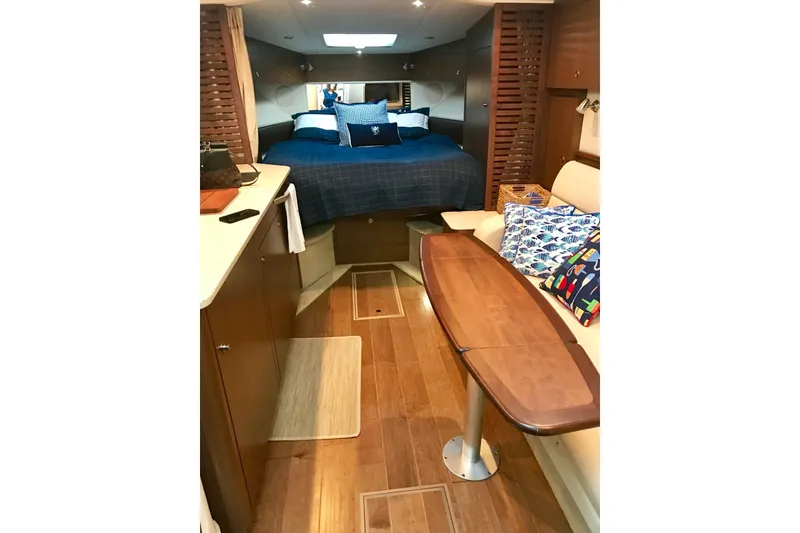 Slide: The Image of Luxurious interior of 2017 Sea Ray Sundancer 370 yacht with cozy bed and elegant seating area. - 19