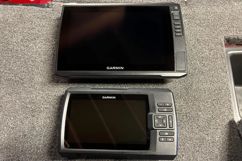 Slide: The Image of Garmin fish finders on 2020 Tracker Pro Team 175 TXW boat, displayed on gray carpet. - 11