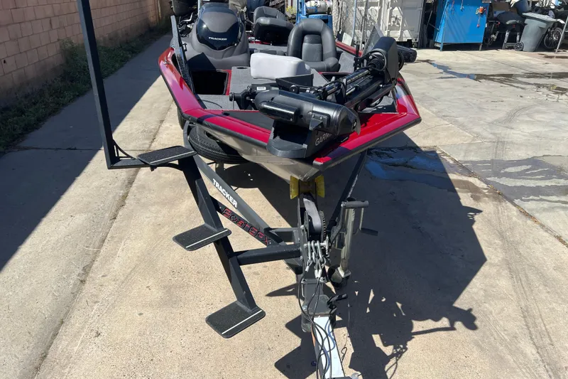 Slide: The Image of 2020 Tracker Pro Team 175 TXW boat on trailer, parked outdoors. - 3