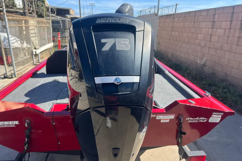 Slide: The Image of 2020 Tracker Pro Team 175 TXW boat with Mercury 75 engine, parked outdoors. - 6
