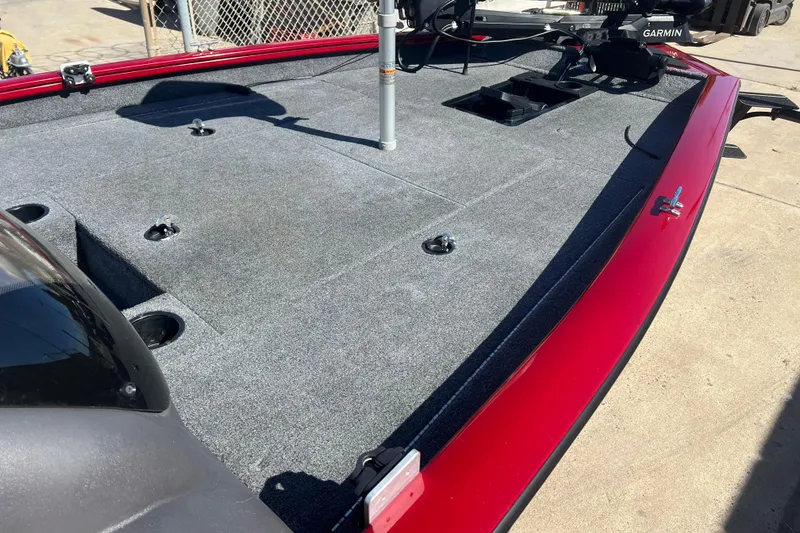 Slide: The Image of 2020 Tracker Pro Team 175 TXW boat deck with red trim and fishing equipment. - 8