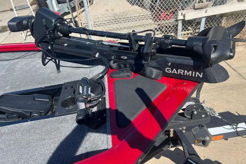 Slide: The Image of 2020 Tracker Pro Team 175 TXW with Garmin trolling motor on red deck. - 9