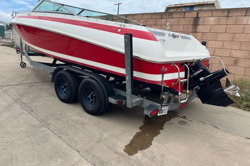 Slide: The Image of Engine compartment of a 1996 Cobalt 220 boat, showcasing detailed mechanical components. - 2
