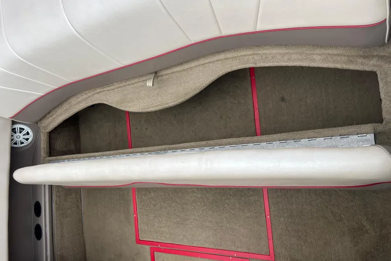 Slide: The Image of Dashboard controls of a 1996 Cobalt 220 boat, featuring switches and gauges. - 20