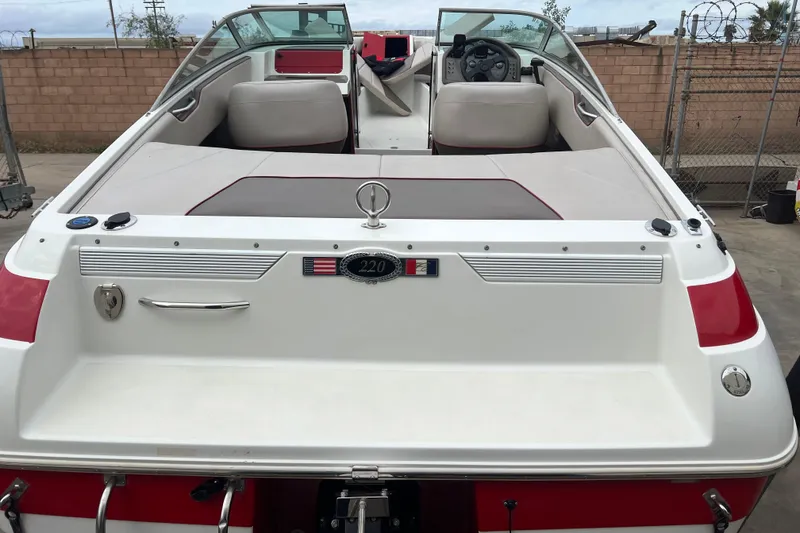 Slide: The Image of Maximum capacity label for 1996 Cobalt 220 boat, 9 persons or 1450 lbs. - 31