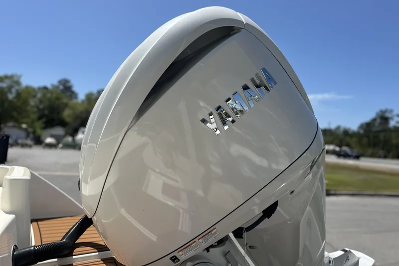 Slide: The Image of Yamaha outboard motor on 2026 Pathfinder 2400 TRS boat, sunny outdoor setting. - 5