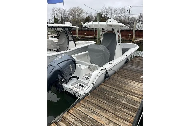 The Image of 2024 Sea Fox 248 Commander boat docked, featuring Yamaha outboard motor. - 1
