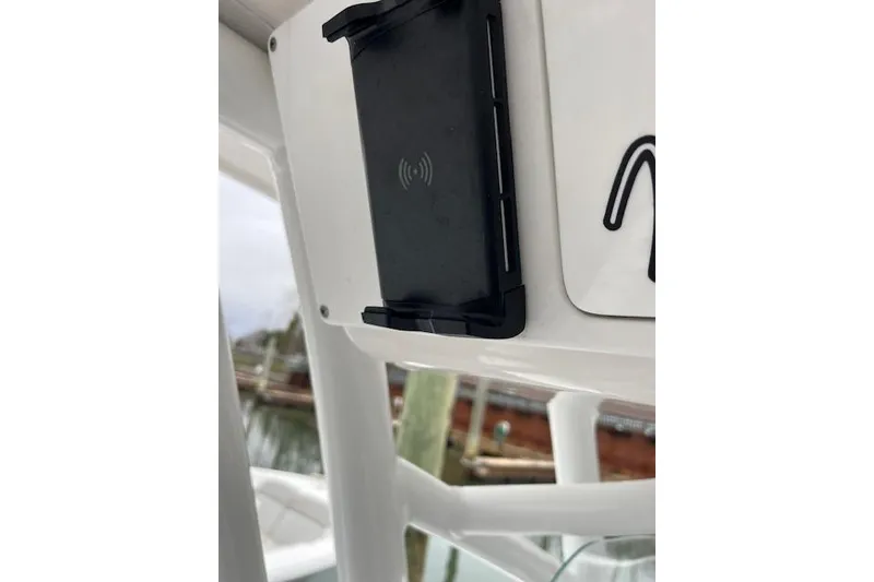 Slide: The Image of 2024 Sea Fox 248 Commander boat with a mounted wireless charging pad. - 17