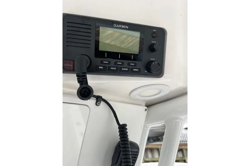 Slide: The Image of Garmin marine radio on 2024 Sea Fox 248 Commander boat dashboard. - 18