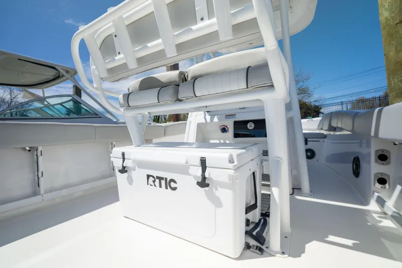 Slide: The Image of 2024 Sea Fox 248 Commander boat interior with RTIC cooler and seating. - 22