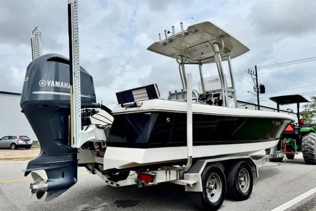 Slide: The Image of 2015 Robalo 226 Cayman boat on trailer with Yamaha outboard motor. - 4