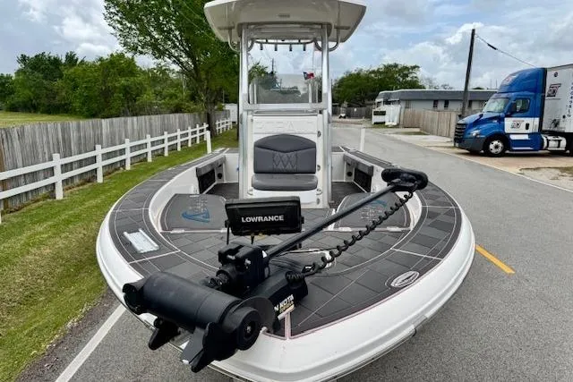 Slide: The Image of 2015 Robalo 226 Cayman boat with Lowrance equipment on a road. - 6