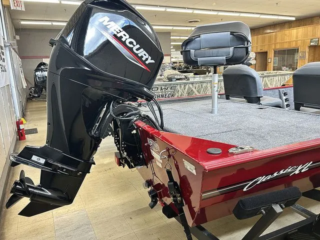 Slide: The Image of 2026 Tracker Bass Tracker Classic XL with Mercury engine in showroom. - 13