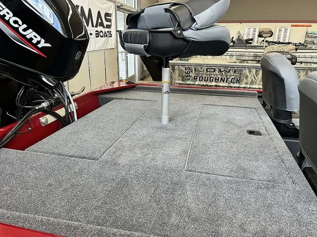 Slide: The Image of Interior of 2026 Tracker Bass Tracker Classic XL with seat and carpeted floor. - 7