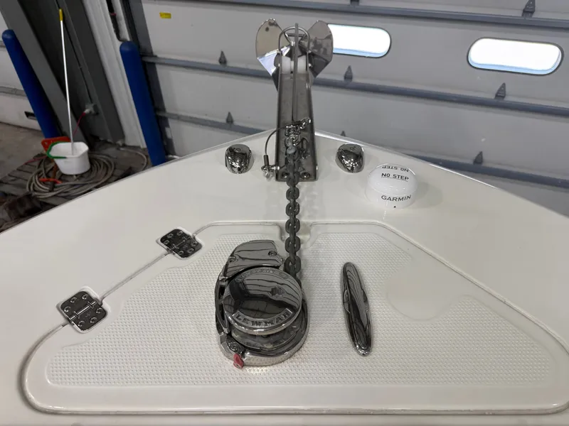 Slide: The Image of Anchor area of a 2018 Sailfish 245 DC boat in a workshop. - 11