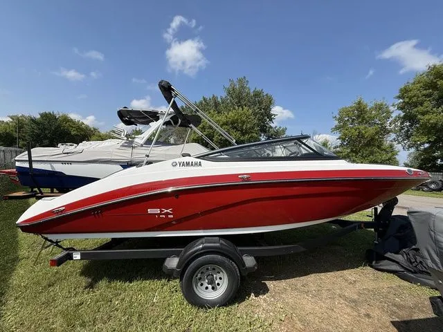 The Image of Red 2025 Yamaha SX195 boat on trailer, side view. - 1