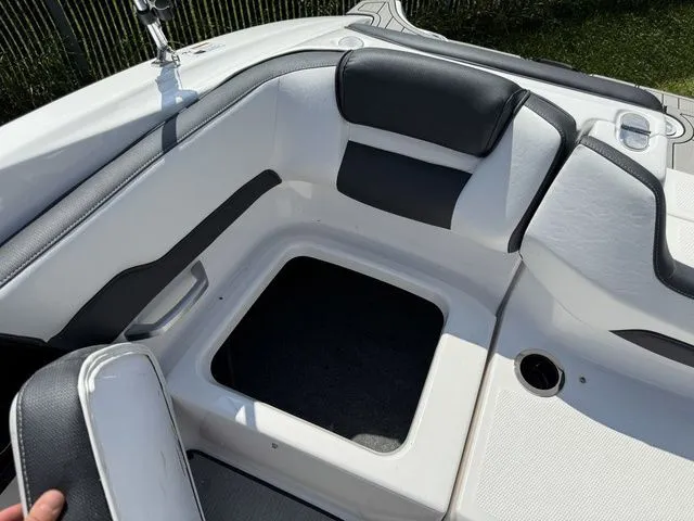 Slide: The Image of Interior of 2025 Yamaha Boats SX195 with seating and storage area. - 11
