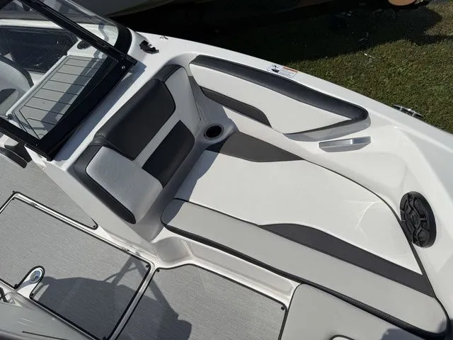 Slide: The Image of Interior of 2025 Yamaha SX195 boat with gray and black seating. - 23