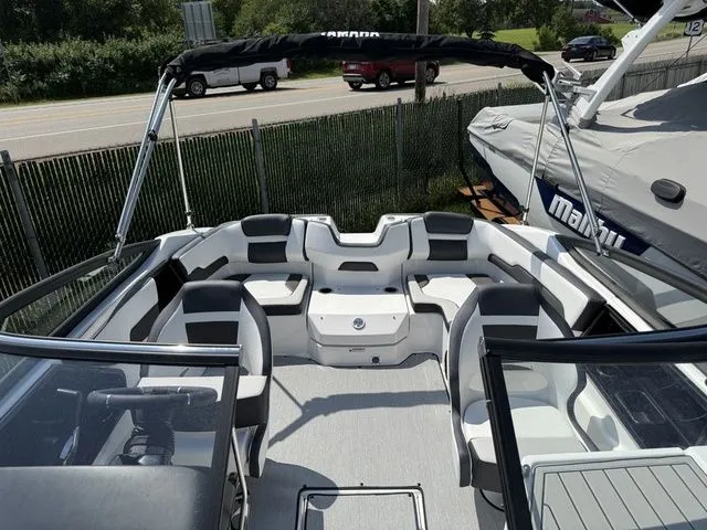 Slide: The Image of Interior of a 2025 Yamaha SX195 boat with seating area. - 27