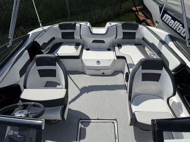 Slide: The Image of Interior of a 2025 Yamaha SX195 boat with modern seating. - 28