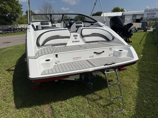 Slide: The Image of Rear view of a 2025 Yamaha SX195 boat on grass. - 5