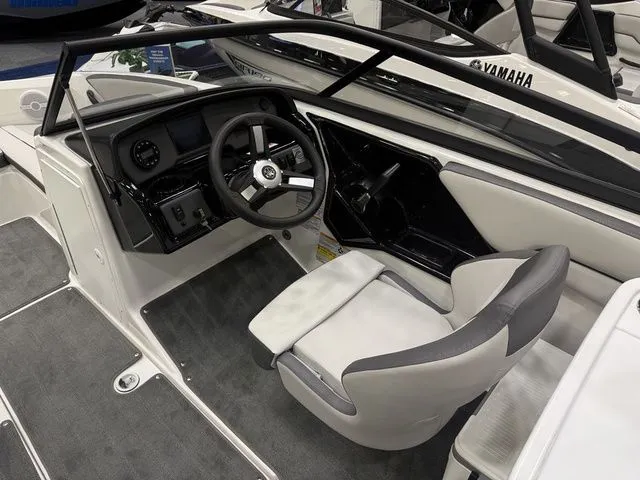 Slide: The Image of Interior of 2026 Yamaha SX190 boat featuring modern helm station. - 11