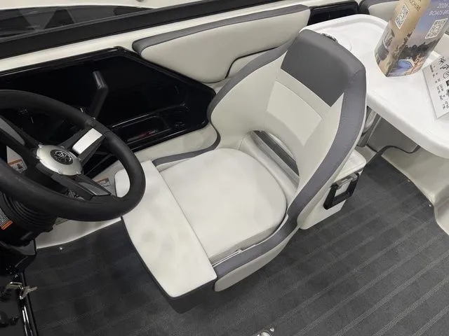 Slide: The Image of Interior of 2026 Yamaha Boats SX190 with steering wheel and seat. - 12