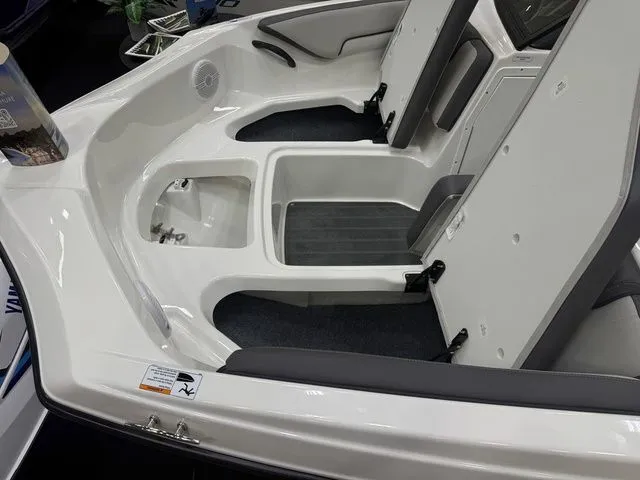 Slide: The Image of Interior of 2026 Yamaha Boats SX190 with seating and storage. - 23