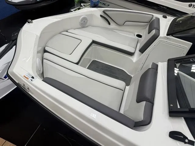 Slide: The Image of Interior of 2026 Yamaha SX190 boat with white and gray seating. - 24
