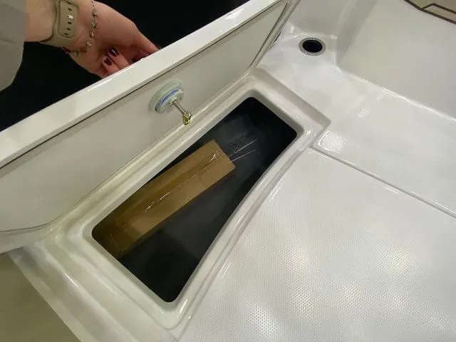 Slide: The Image of Storage compartment in 2024 Yamaha Boats 255 FSH Sport H. - 26