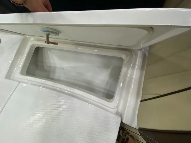 Slide: The Image of Storage compartment in 2024 Yamaha Boats 255 FSH Sport H. - 27