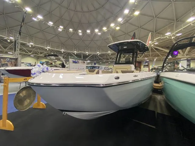 Slide: The Image of 2024 Yamaha Boats 255 FSH Sport H at a boat show. - 4