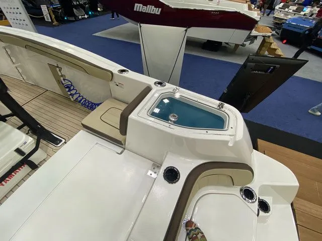 Slide: The Image of Interior view of 2024 Yamaha Boats 255 FSH Sport H with seating area. - 8