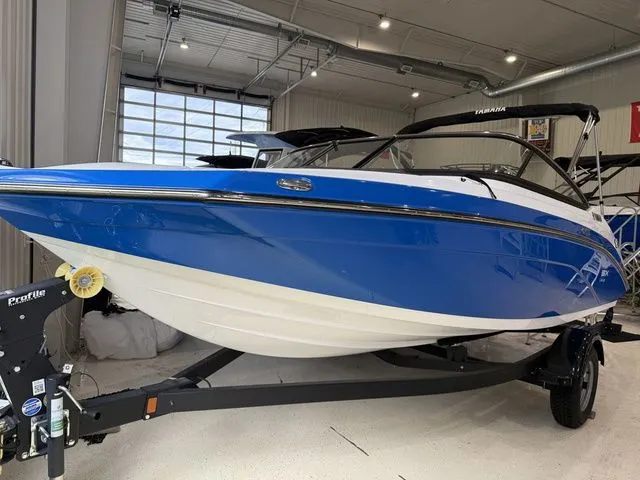 The Image of 2025 Yamaha SX195 boat displayed in a showroom. - 1