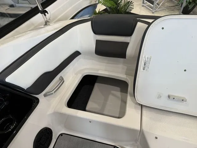 Slide: The Image of Interior of 2025 Yamaha SX195 boat with storage compartment. - 11