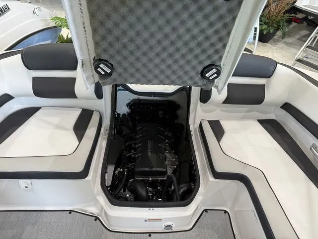 Slide: The Image of Yamaha Boats SX195 2025 engine compartment with open hatch. - 14