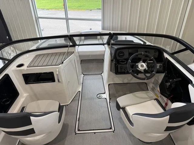 Slide: The Image of Interior of 2025 Yamaha SX195 boat with modern helm console. - 16