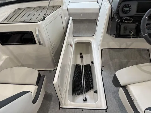 Slide: The Image of Interior of 2025 Yamaha SX195 boat with storage compartment. - 17