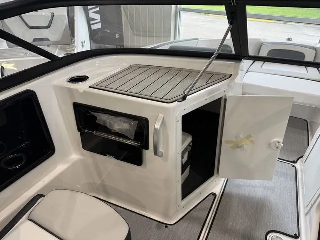 Slide: The Image of Interior of 2025 Yamaha SX195 with storage and seating area. - 20