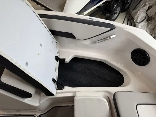 Slide: The Image of Interior of 2025 Yamaha SX195 boat with storage compartment. - 29