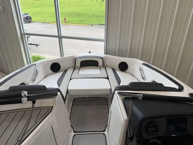 Slide: The Image of Interior view of 2025 Yamaha SX195 boat with luxurious seating arrangement. - 30