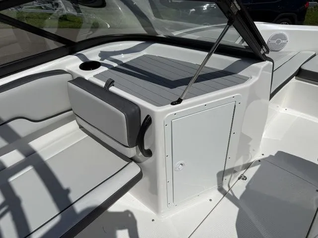 Slide: The Image of Interior of 2025 Yamaha Boats AR190 with seating and storage area. - 19