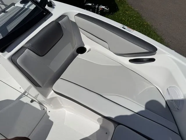 Slide: The Image of Interior of 2025 Yamaha Boats AR190 with gray and white seating. - 26
