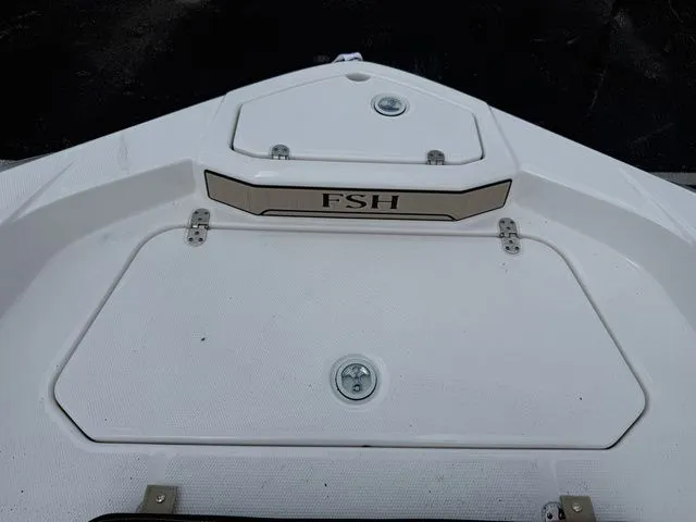 Slide: The Image of Yamaha Boats 2025 195 FSH Sport front deck view. - 25