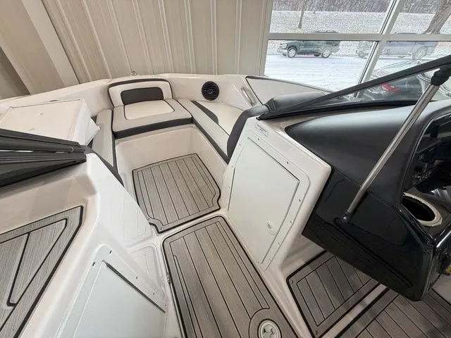Slide: The Image of Interior of 2025 Yamaha Boats 195S with modern seating and flooring. - 19