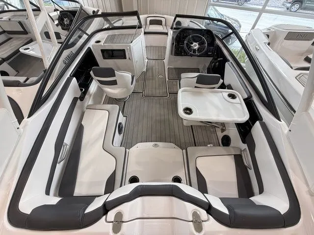 Slide: The Image of Interior of 2025 Yamaha Boats 195S with modern seating and steering wheel. - 7