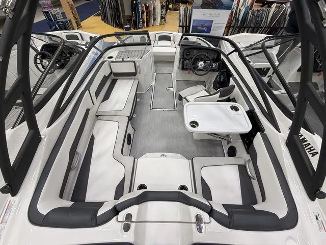 Slide: The Image of Interior of 2025 Yamaha Boats AR195 with modern seating and helm console. - 4